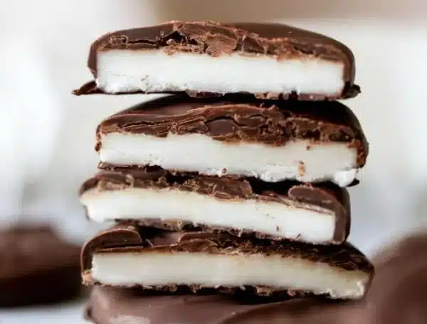 Homemade peppermint patties covered in decadent chocolate coating